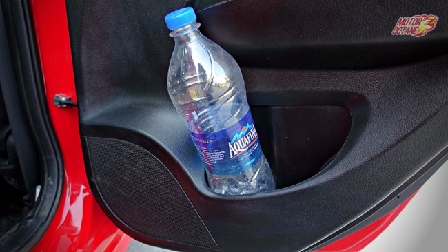 1-litre bottle doesn't fit into Swift's rear door pocket 