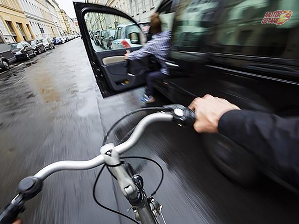 Here's Why use the Opposite Hand to Open Your Car Door » MotorOctane